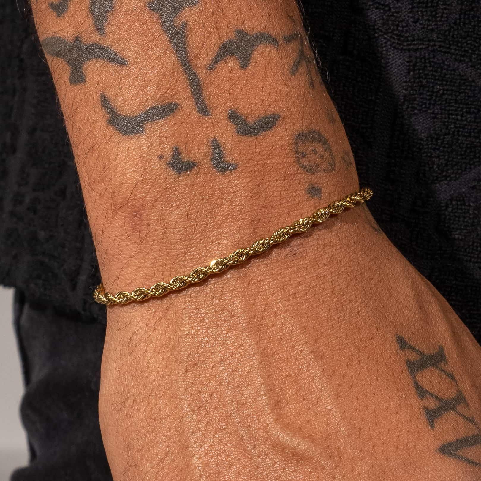 2.5mm gold rope bracelet on wrist with tattoos, 18K plated, Adamans jewelry.