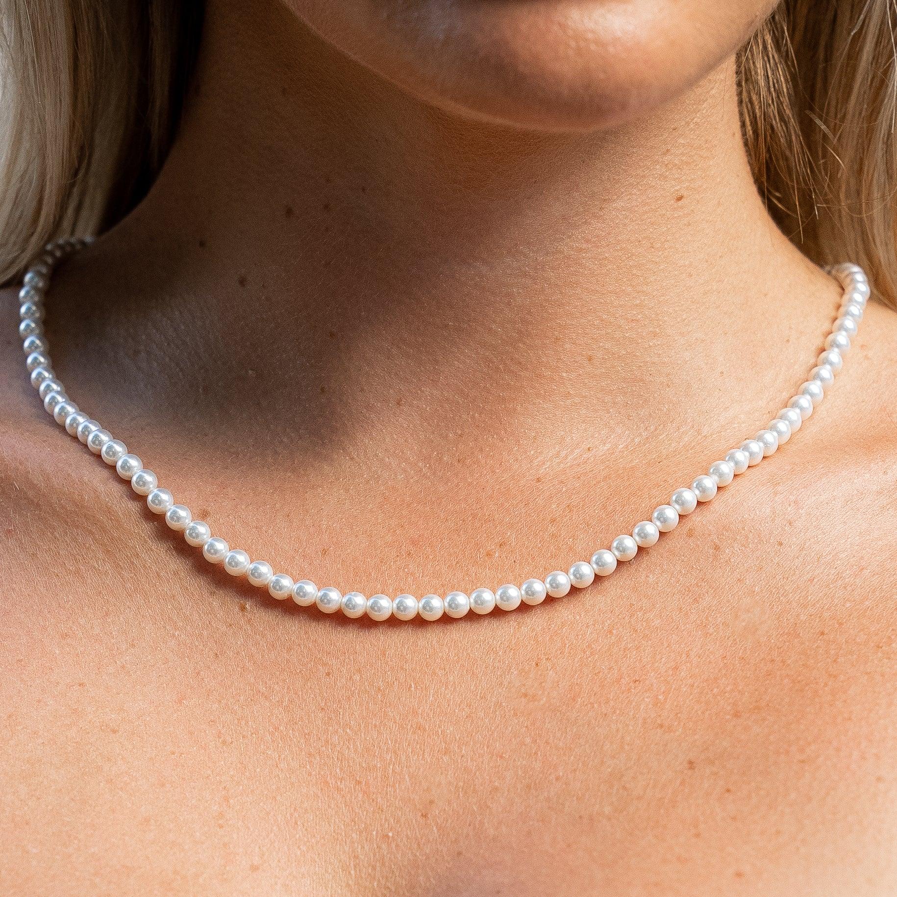5mm pearl necklace with 925 silver chain featuring fresh water pearls.