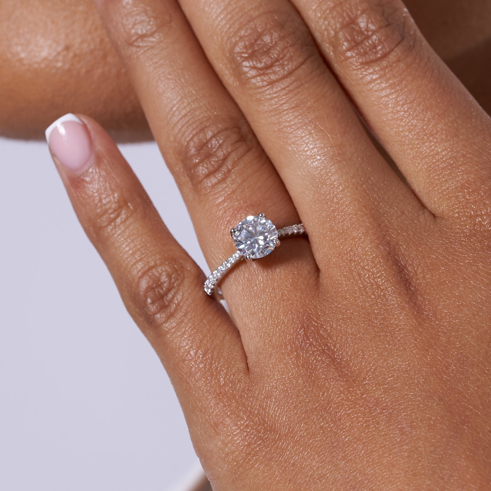 Round Cut Tapered Solitare Moissanite Engagement Ring