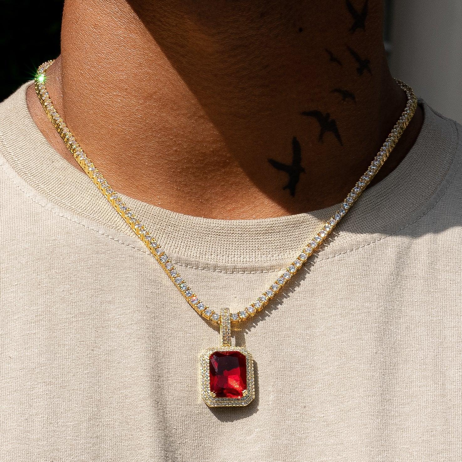 Ruby gem pendant in gold on a necklace, featuring flawless VS diamond simulants.