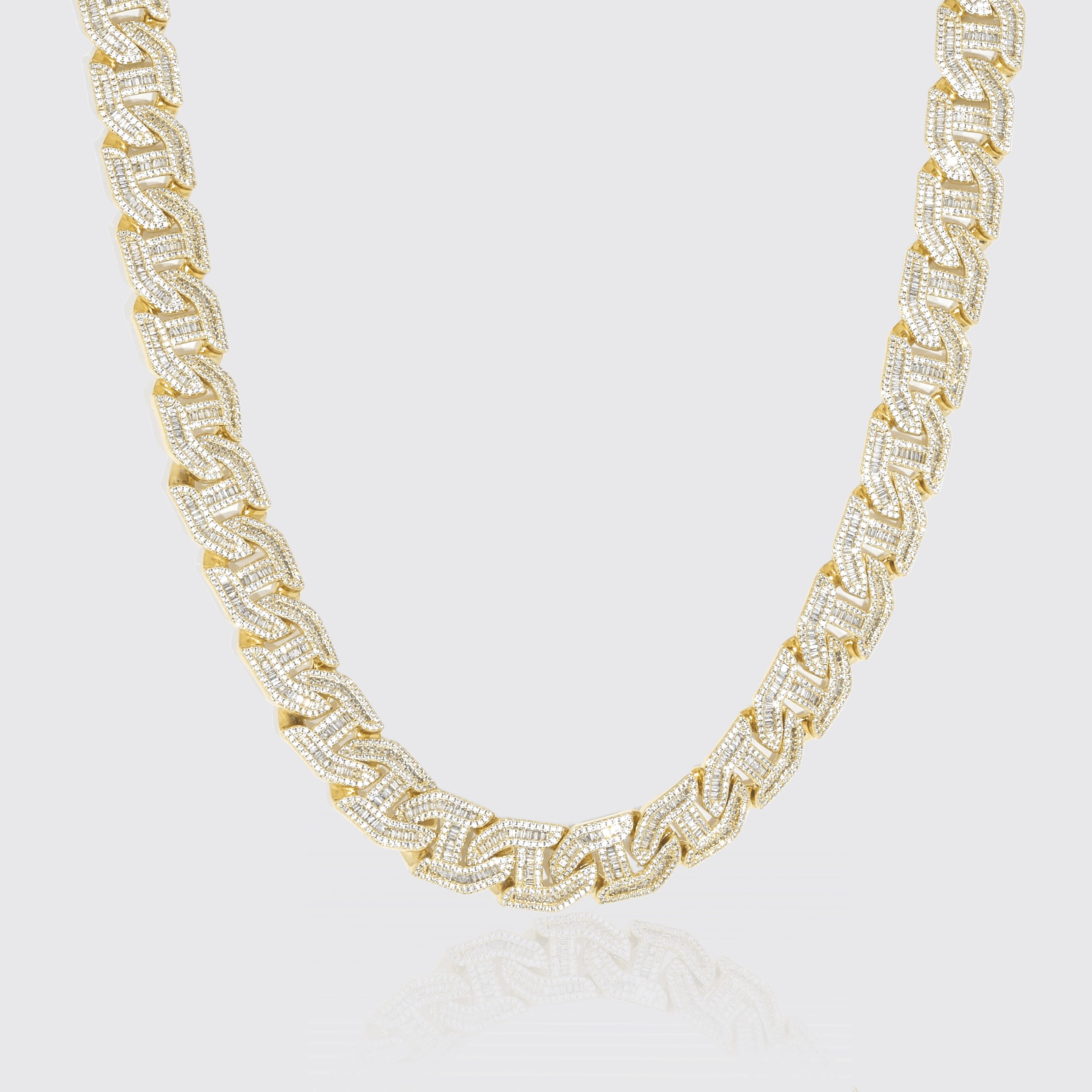 17mm gold link chain with prong-lifted baguette stones and flawless diamond simulants.