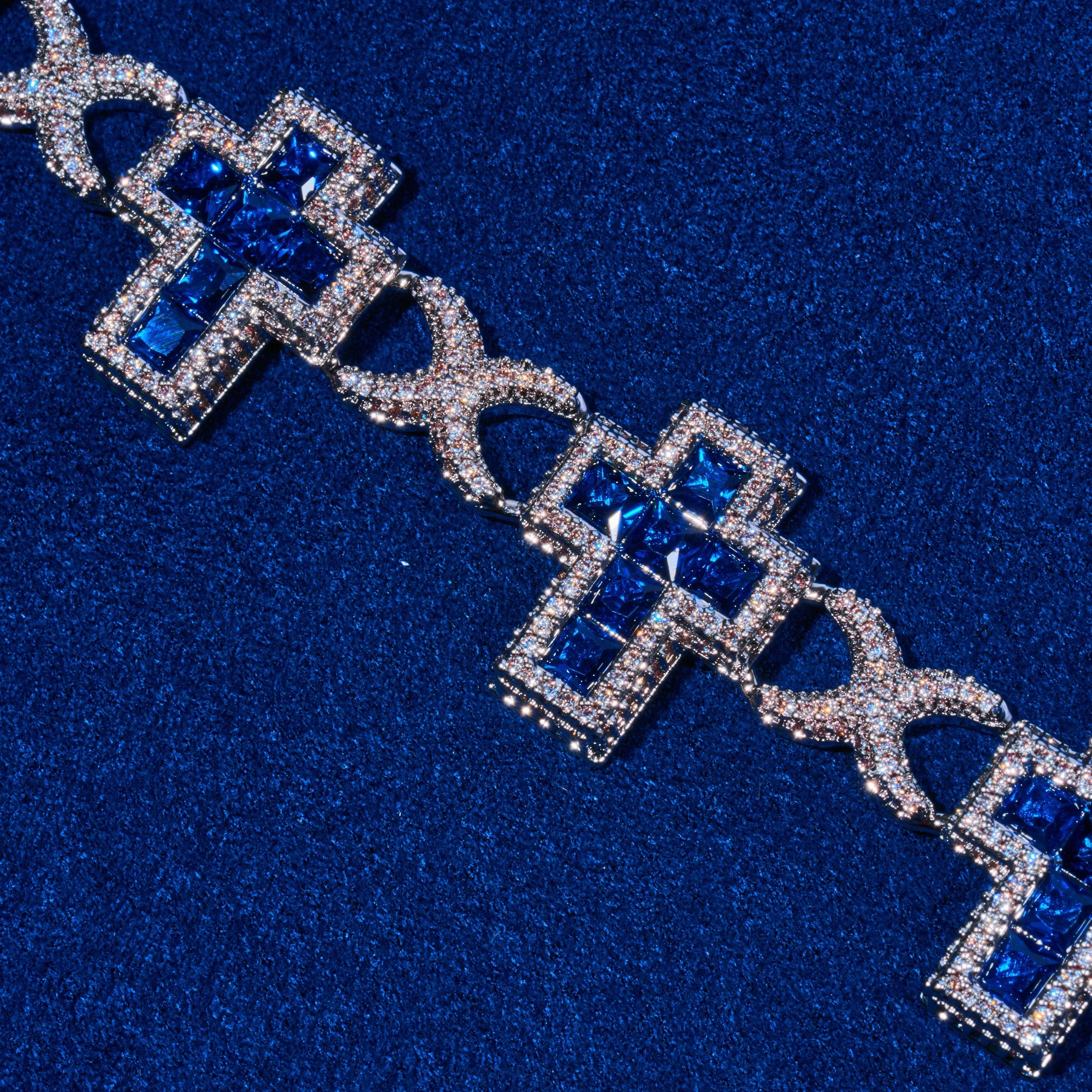 Iced Sapphire Cross Bracelet – White Gold
